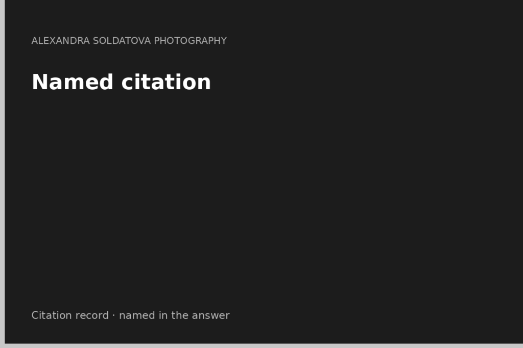 Named citation — the credit line inside an AI answer